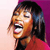 Pixelated close-up of a person with dark hair wearing a red top, mouth open in a wide smile against a gradient background.