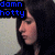 Pixelated image of a person with dark hair and light skin in profile, wearing black clothing against a dark background with blue text reading "damn hotty".