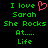 Green pixelated text on black background with pink heart symbol, repeated twice in a