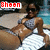 Pixelated image of a person in a bikini top and shorts lying on a white surface with a speech bubble containing red text.