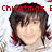 Pixelated image of a person with dark brown hair and red highlights, smiling against a white background with red text reading "Christmas & Happy Ho".