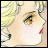 Anime-style character face with blonde hair, brown eyes, and red lips on a light background, next to pixelated text on black.