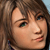 Pixelated close-up of a person's face with brown hair, green eyes, and light skin tone against a blue background.