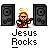 Pixel art of a bearded figure with halo playing red guitar, surrounded by speakers and "Jesus Rocks" text on gray background.