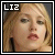Static pixelated image of a person with light brown hair and closed eyes, featuring white text 'LIZ' in the top-left corner.