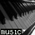 Black-and-white pixelated image of piano keys with 'MUSIC' text in a black rectangle and small white heart symbol.