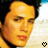 A 48x48 pixel animated buddy icon featuring a close-up of a person's face with two distinct heart symbols in the bottom corners across frames, displayed as a contact sheet.