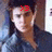 A person with dark hair and a dark shirt appears in three , each showing different red text above the head