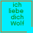 Four identical cyan squares with orange borders display green text reading 'ich liebe dich Wolf' and contain small pixelated symbols in the bottom-right corners.
