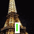 Animated sequence showing Eiffel Tower with changing text overlays: 'I', then 'Love', and finally 'Paris' in pink.