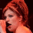A 48x48 pixel animated buddy icon featuring a partial image of a person with red hair singing into a microphone alongside stylized text reading "Miss Independent" in green and pink lettering, displayed as part of a contact sheet layout.