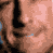 A dark blue background displays white and yellow text with a central figure's face in three side-by-side above the text