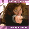 A person with long curly brown hair points a wand toward the viewer, wearing a black top with gray sleeves, framed by purple borders with text.