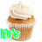 Six identical cupcakes with white frosting arranged in a , each overlaid with distinct pixelated text in green or pink