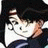 A 48x48 pixel buddy icon featuring a stylized anime character with dark hair and light skin on the left, paired with text reading "Anime IM" above "COM" on a black background.