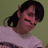 A static image shows a person with dark hair and an orange mark on their face, alongside green containing the text 'Loose Lips Sink Ships' in white pixelated font