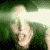 A pixelated animated sequence shows a person with green hair and light skin making exaggerated facial expressions against a dark background.