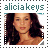 Alicia Keys portrait with long dark hair, wearing a light-colored top, under text reading 'alicia keys' in teal pixelated font.