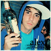 A person in a blue hoodie and white cap holds a bottle and a white object, with 'alex' text visible at the bottom right.