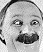 Static grayscale pixel art of a man's face with prominent mustache, visible in 43x52 icon frame on gray background.