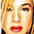 Pixelated close-up of a person's face with red lips and light hair next to black text reading Coolbuddy.com on white background