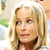 Static 50x50 pixel buddy icon showing a close-up of a person with blonde hair and light skin tone, cropped to show only the upper face and shoulders against a blurred background.
