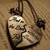 Animated heart-shaped icon with cracked surface, hanging from a string against a wooden background.
