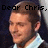 A pixelated image of a person in a white-collared shirt with text above their head reading 'Dear Chris, Will You Marry Me?'