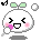 Pixelated cartoon character with white rounded body, green leaf-like ears, pink cheeks, and purple mouth accessory in two expressions against gray background.
