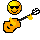 A 2x2 grid of four identical pixel art icons featuring a yellow smiley face with black sunglasses holding an orange guitar, each in slightly different animation frames showing the guitar's position and flame effect.