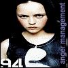 A sequence of pixelated images showing a person in a black sleeveless top with a white circular design, transitioning through various visual effects including color shifts, pixelation, and text overlays.