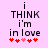 Pixelated text on light purple background with red hearts, showing animation where heart colors shift between frames.
