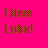 Pixelated text reads "I love Luke!" on a bright pink checkered background with brown and orange lettering.