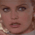 Static 50x50 pixel icon showing a close-up of a person's face with brown hair and light skin tone, rendered in low-resolution pixel art style.