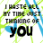A contact sheet of 10 animated frames showing a repeating text-based design with blue and green abstract lines on white background, each frame displaying the phrase "I WASTE ALL MY TIME JUST THINKING OF YOU" in bold black letters.