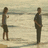 Two figures stand on a beach with water and horizon in background; red displays text 'LOVE', 'miss', 'see' with heart symbols and repeated 'ya'