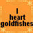 Orange background with white star and line patterns, black text reading 'I heart goldfishes' repeated in four quadrants.