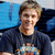 A pixelated image shows a person in dark clothing with a colorful graphic on the chest, next to two blue text bubbles containing 'JF86P' and 'MCCARTNEY'.