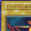Golden card with Japanese text at top, blue background in central showing animated golden flame-like shapes transitioning between distinct forms