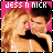 Pixelated image of two people with blonde and brown hair against a pink background, text "JESS N MCK" at top.
