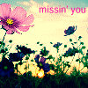 Pixelated pink flower with yellow center, blue butterfly, and 'missin' you' text over soft sky background.
