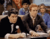 Five distinct scenes from a vintage television show featuring characters in period attire, with visible background details and character interactions.