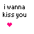 Pixel art image with text and clock icons showing 'i wanna kiss you' with a pink heart, two red clocks labeled 'minute', and one yellow sun icon reading 'of the day'.