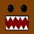 Pixelated brown face with two dark oval eyes and a wide rectangular mouth filled with jagged red and white shapes.