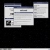 Static pixelated image showing overlapping rectangular UI elements with light gray and white sections against a black background.
