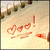 Pixelated red text 'Yay!' on a light beige background with brown accents at the top.
