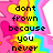 Pixelated text on a rainbow star background with pink hearts, displaying 'dont frown because you never smile' and 'know whos in love with your'.
