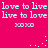 A static image with a bright pink background displays repeated light blue text "love to live" and "live to love" in two , each followed by "xoxo", with scattered white dots