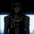 Pixelated character with silver hair and dark clothing, transitioning from shadowed to fully lit expressions against a black background.