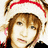 Pixelated image of a person wearing a white and red headband with brown hair, set against dark blue background text elements.